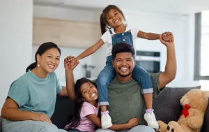 Happy Family in Their Home – Cherishing Togetherness